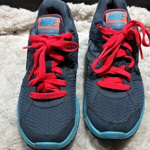 Nike womens Navy Sneakers with Bright Red Laces and Aqua Soles